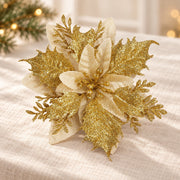 Fleur de Noël Éclat dorée, 14 cm, mise en scène sur lin ivoire