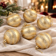 Détail de l’assortiment 6 boules dorées à spirales pailletées – 6 cm, présenté sur du lin ivoire