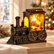 Petit train de Noël lumineux à finition bronze patiné, panneau décoratif Père Noël